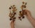 Made in Italy A charming pair of Italian sconces crafted from gilded metal, resembling leaves and flowers. Both sconces...