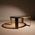 Elegant and expressive round coffee table from the Netherlands dating back to the 1970s. This extravagant piece of...