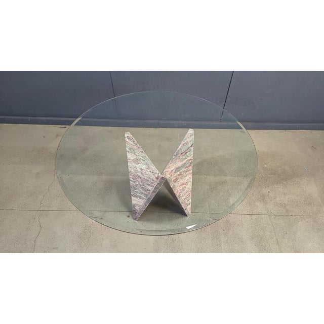 Striking architectural design marble dining table. Very cool design with a gorgeous natural veining and a beautiful clear...