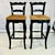 We love the casual and yet chic charm of a Ladderback chair with rush seats. This is a pair of barstools from the 1980s...
