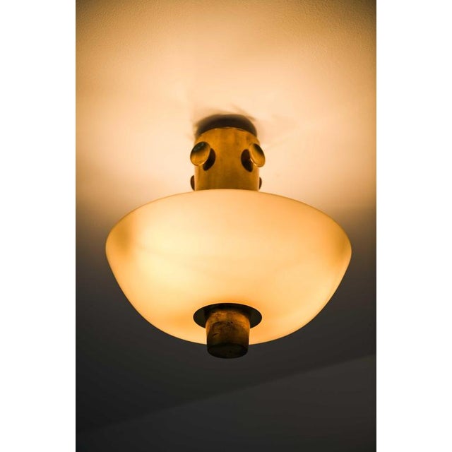 Gold Modern Scandinavian Ceiling Lamp in Brass and Opaline Glass by Paavo Tynell, 1950s For Sale - Image 8 of 11