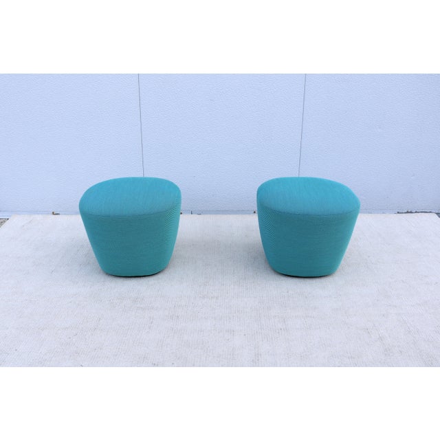 Fabulous pair of Beat ottomans in blue-teal wool blend upholstery, designed by Estudio Andreu and made in Spain by the...