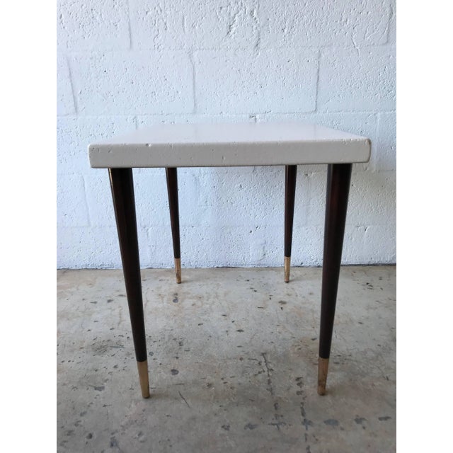 Cork top side or end table designed by Paul Frankl for Johnson Furniture Company, rendered in lacquered cork for the top...