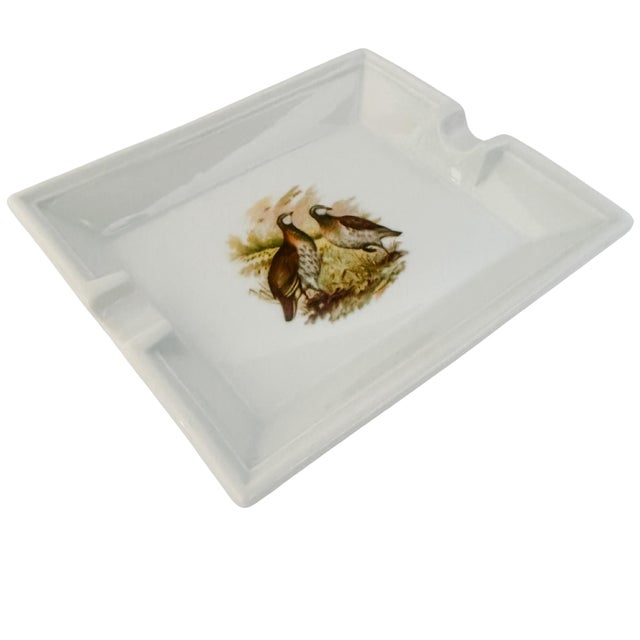 Made in a classic French country style, this beautiful Porcelaine des Brémailles rectangular porcelain ashtray was bought...