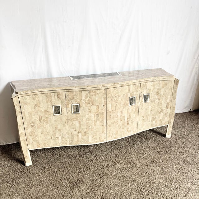 A striking statement piece, this postmodern credenza captures the bold sophistication of Maitland Smith’s iconic style....