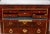 French Charles X chest of drawers in mahogany feather with white statuary marble top. The front is punctuated by three...