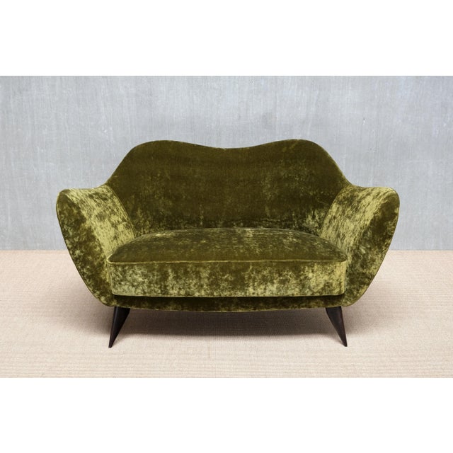 This rare loveseat, designed by giulia veronesi and produced by isa bergamo in the early 1950s, belongs to the celebrated...