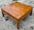 This vintage Boho burl wood campaign coffee table blends rustic charm with functional design, featuring rich wood grain...