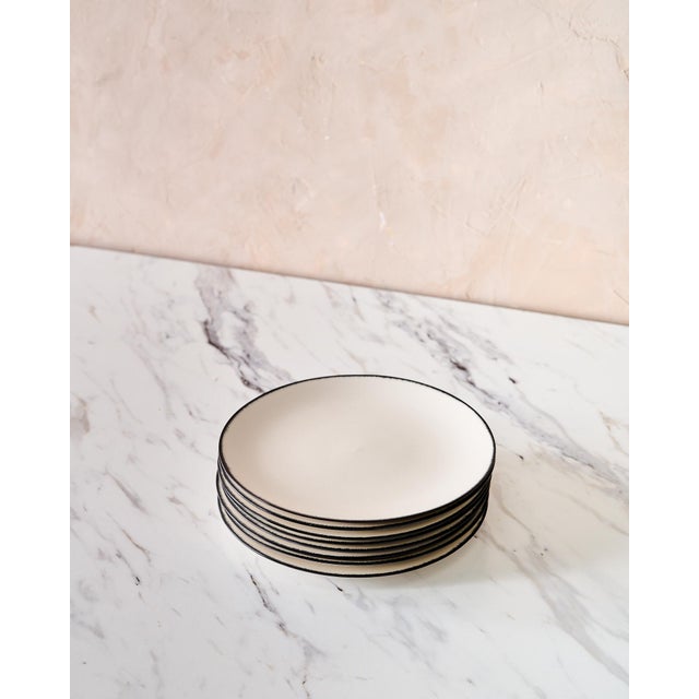 Set of 8 "Variation 1 Dé" Dessert Plates by Ann Demeulemeester for Serax, crafted in white glazed porcelain with a hand-...