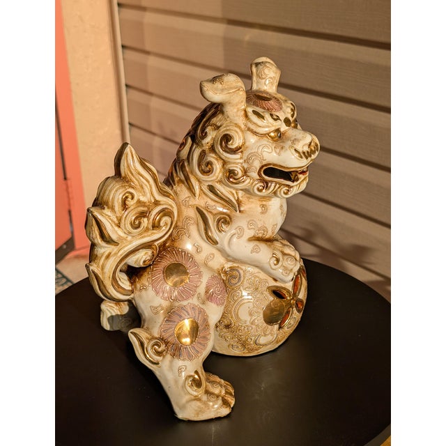A bold and intricately detailed vintage Japanese Kutani Shishi (Foo Dog) statue, crafted in the 1980s during Japan’s Showa...