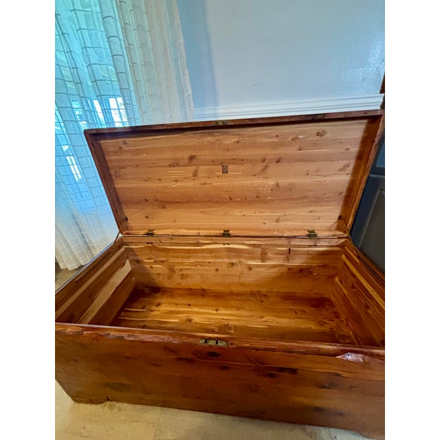 Add a touch of warm, rustic charm and exceptional craftsmanship to your home with this beautiful vintage cedar chest....