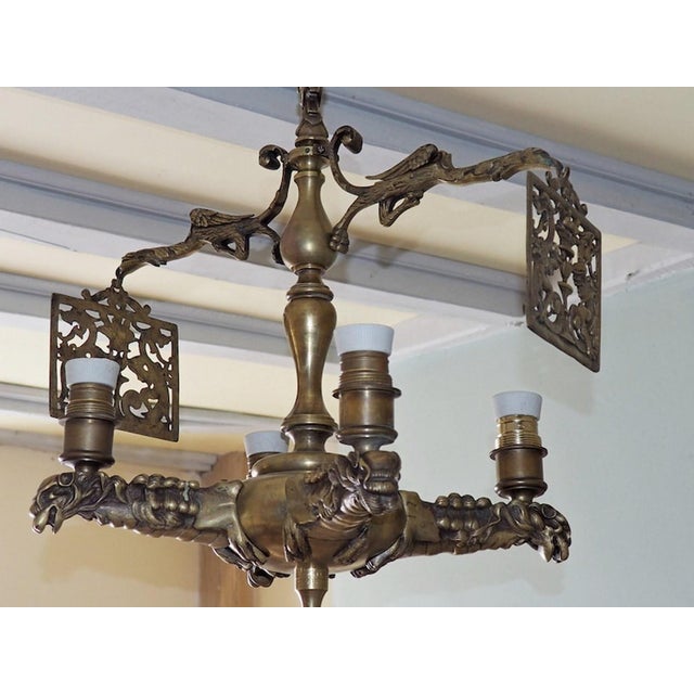 Antique Gothic Brass Dragon Griffin Chandelier, 1890s, in Very Good conditions. Designed 1890 to 1919 Up to 250V...