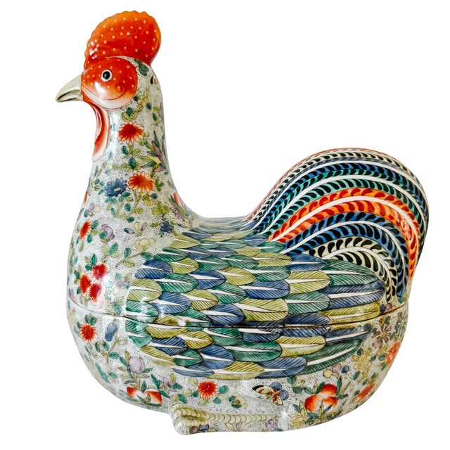 A striking statement piece for the sideboard, dining table, or entryway console, this vintage Chinese export porcelain...