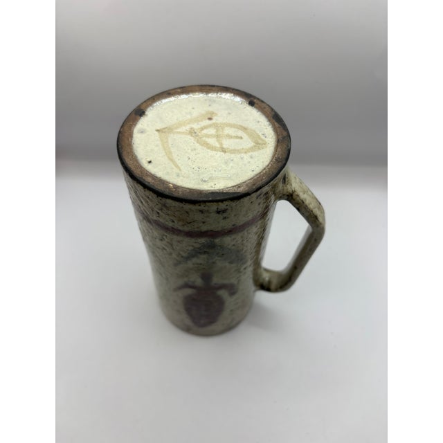 Gustave Reynaud glazed ceramic mug. Gustave Reynaud (1915–1972), a ceramicist based in Vallauris, was the founder of the...