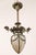 This converted gas chandelier now turned pendant light features ornate floral and steel swag detail with a beige stained...