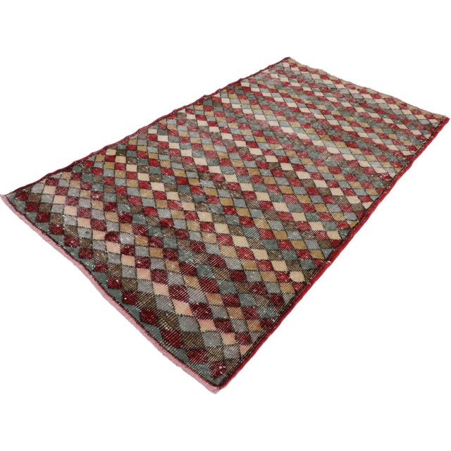 distressed vintage Turkish Sivas rug with rustic Mid-Century Modern style. This hand knotted wool distressed vintage...