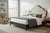 Stunning, like-new King bed with a beautiful creamy tufted headboard. Comes complete with side rails, footboard, and...
