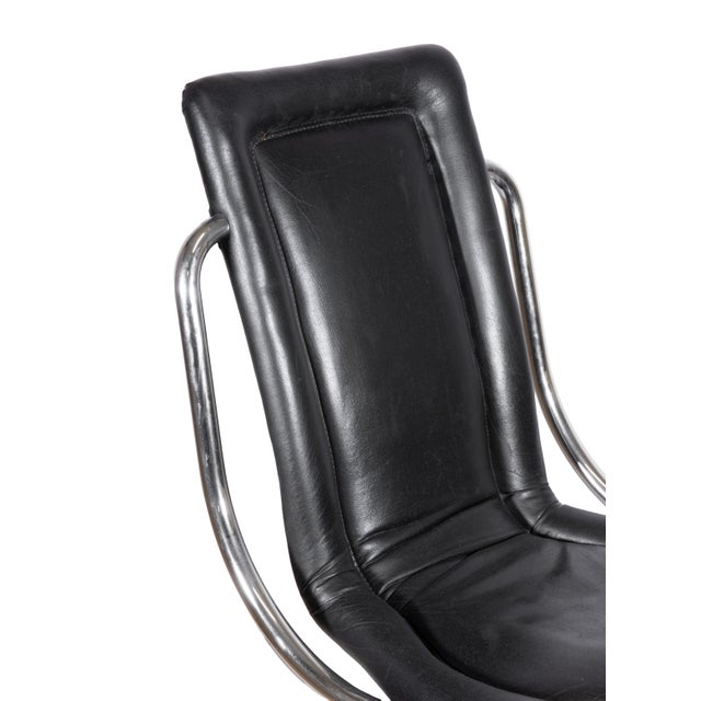 Six Chairs by Tecnosalotto, Italy 1970s. Tubular steel and black leather. h70 x 58 x 47 cm. Sitting depth 39 cm , seat...