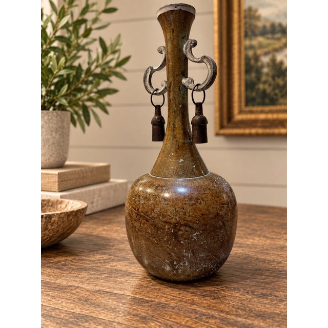 A truly distinctive vintage Indian metal vessel with a beautiful bronze appearance, wonderful natural patina, and an...