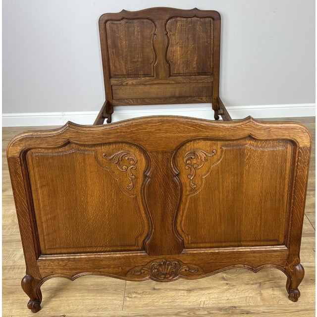 Bring classic French charm into your home with this beautiful Vintage French Louis Oak single bed frame. Crafted in oak,...