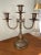 Heavy antique solid brass candelabra. Absolutely perfect patina on this piece.