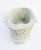 A stunning vintage cast stone planter in a refined Neo-Classical style, featuring rich relief details with fruit swags,...