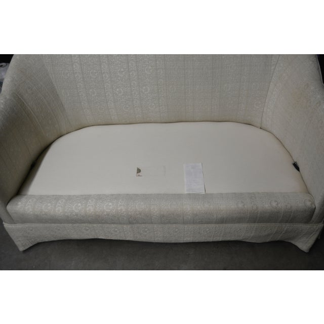 This is a comfortable little elegant curved settee. Vintage Henredon, the main label came off when it was cleaned...