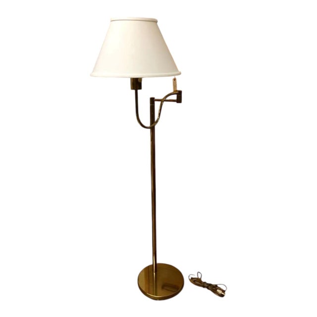 Rare contemporary floor lamp by Casella Lighting featuring a striking adjustable swing-arm design, integrated dimmer...