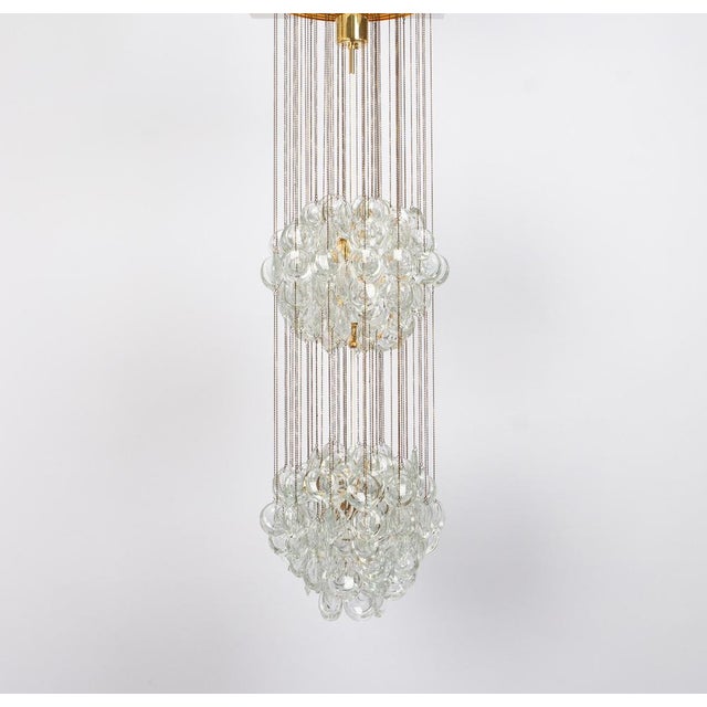 Delicate, rare chandelier with crystal glass and gilded brass parts made by palwa, sciolari design germany, 1970s....