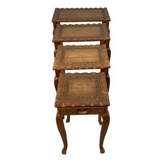 Set of Four Carved Antique Nesting Tables For Sale