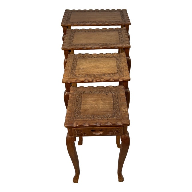 Set of Four Carved Antique Nesting Tables For Sale