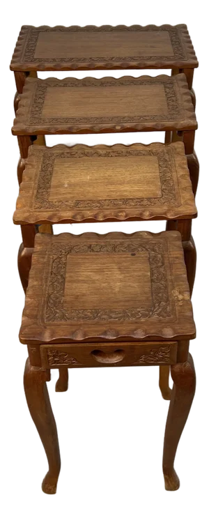 Set of Four Carved Antique Nesting Tables