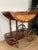 Elegant vintage bar cart crafted in Italy, featuring richly finished hardwood with decorative inlay, sculpted turned legs,...