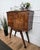 Impressive 1950s Italian sideboard bar cabinet in beautiful burl veneer wood, two front doors and standing on greatly...