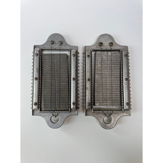Pair of early Belshaw Bros. commercial butter cutters from Seattle, Washington, each constructed with a cast aluminum...