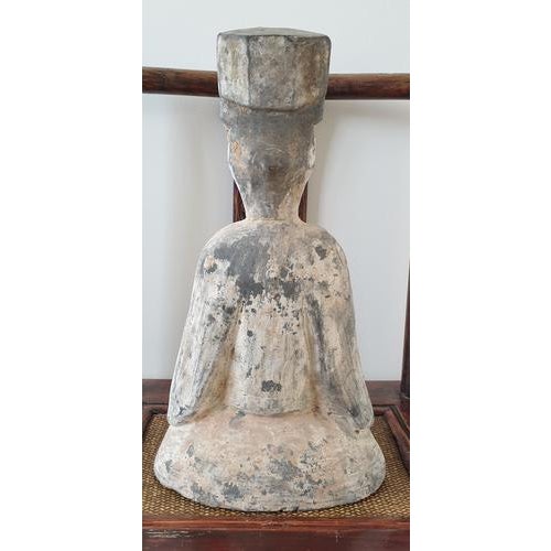 Terracotta seated dignitary, chinese han dynasty (206 bce - 220 ce). beautiful mingqi funeral figure depicting a kneeling...