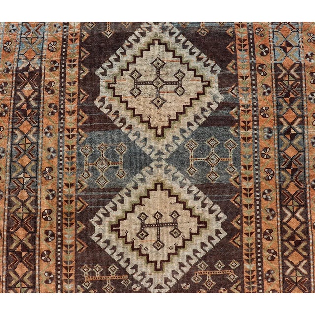 Antique Persian Lori Rug With All-Over Geometric Tribal Medallion Design 4'5 X 8'8 For Sale - Image 4 of 11