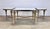 A fabulous mid 20th century set of three Maison Ramsay / Maison Bagues style neoclassical tables with heavy brass finish...