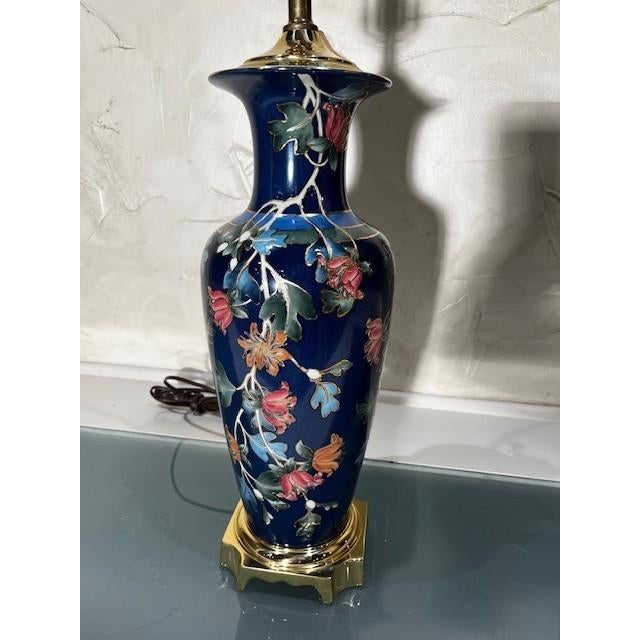 1 Speer Ceramic Lamp, Blue Background Multicolored Floral with Gold Accents, Brass Base and Finial.