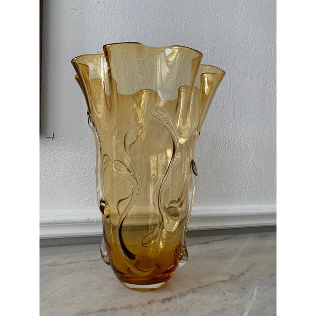 Gorgeous vintage mid-century tall amber blown glass Empoli vase from the Empoli region of Italy. This vintage mid-century...