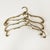 Set of 4 hangers, from Germany, 1960s. They are characterized by beautiful, solid workmanship. Made entirely of brass -...