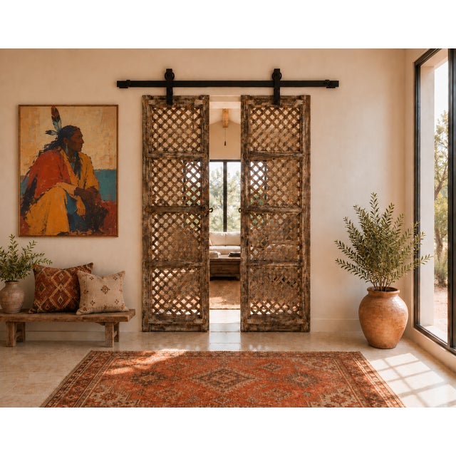 Antique Indian Carved and Sun Bleached Teakwood "Jali" Trellis Door, late 19th century from Rajasthan, features a trellis...