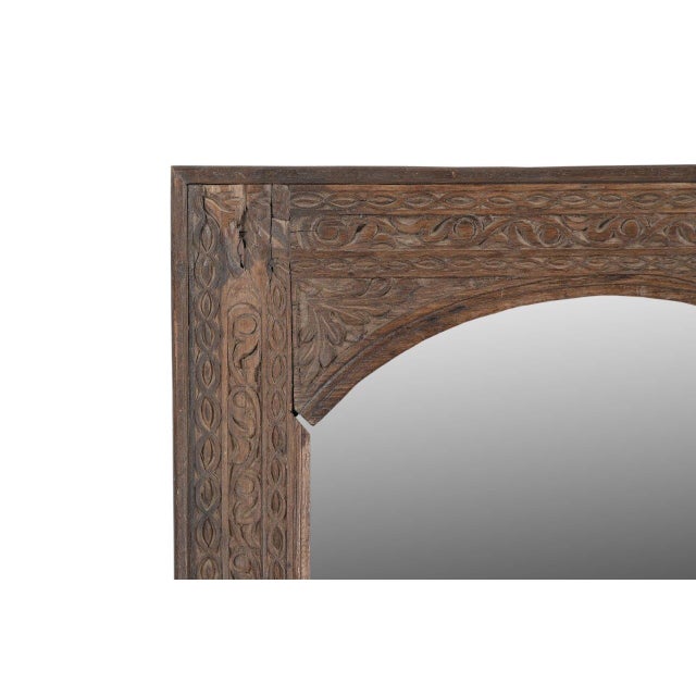 This Vintage Indian Teakwood Window Panel Mirror features a graceful arched opening framed by hand-carved teakwood....
