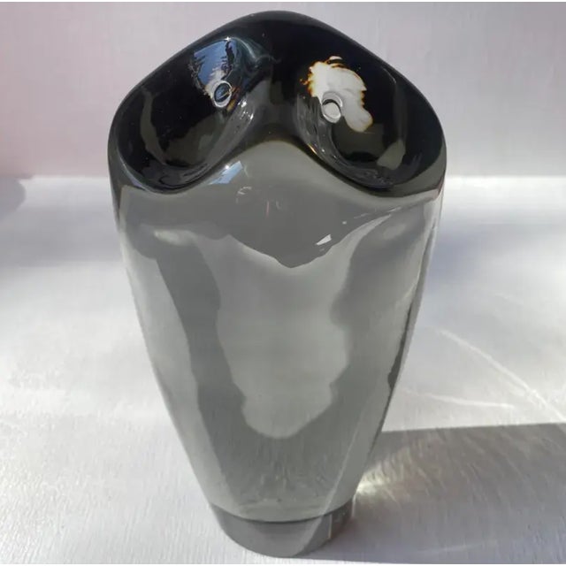 Hand-Made Murano owl sculpture by Livio Seguso, in deep smoked grey glass with the weight and solidity of stone. The form...