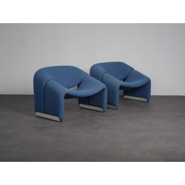 A refined pair of f598 groovy lounge chairs designed by pierre paulin for artifort in the early 1970s. The low, flowing...