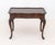 George III Style Mahogany Side Table, the shaped top above four cabriole legs with shell motif carvings. 18.75" H x 25.75"...