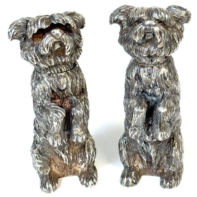 Pair of Edwardian Sterling Terrier Pepper Pots, London, Jonathan Howell, 1906/1913 This whimsical pair of novelty sterling...