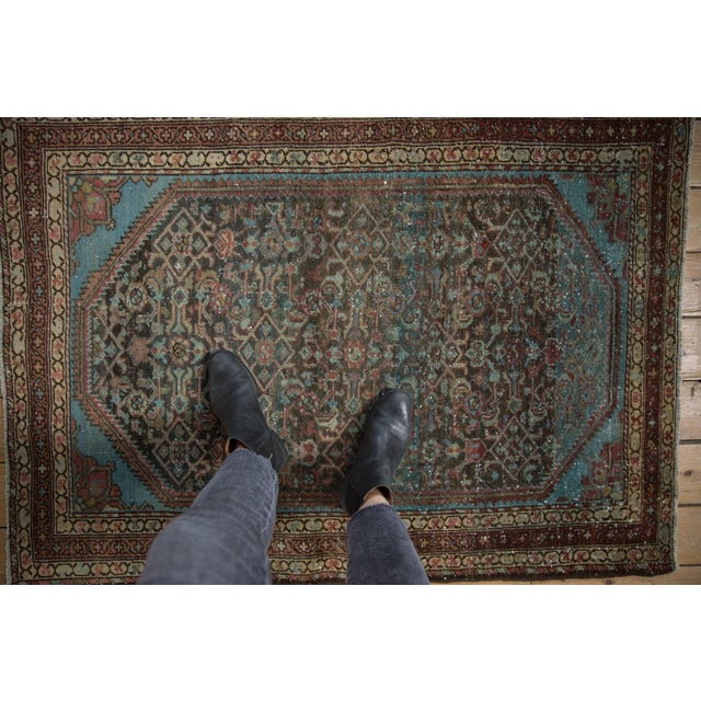 :: Allover covered field in a Herati motif with brilliant blue corner spandrels. Colors and shades include: Navy blue,...