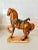 This striking midcentury ceramic horse sculpture captures timeless equestrian elegance with a rich caramel-brown glaze and...