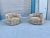 This striking pair of mid-century modern style swivel lounge chairs combines dynamic geometric patterning with a cozy,...
